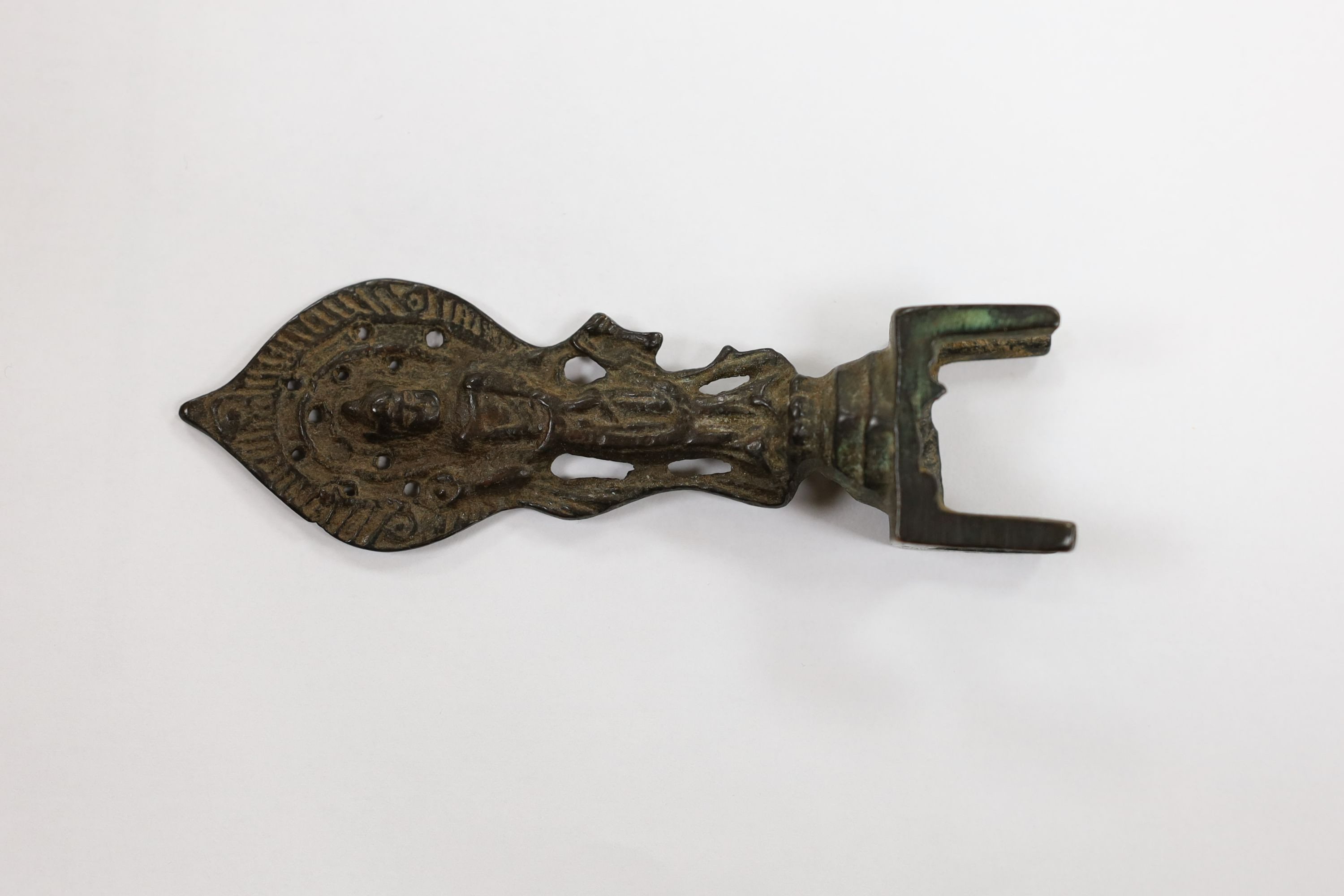 Five Chinese or Tibetan bronze figures or Buddhist implements, tallest 13cms high